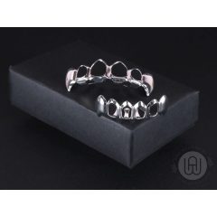 Fog grillz pár arany és ezüst színben vámpír fog 