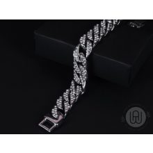 Karkötő iced out ovális szemmel ezüst színben