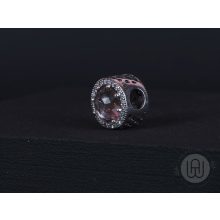 Charm, rózsaszín kő