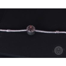 Charm, rózsaszín kő