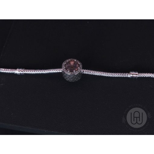 Charm, rózsaszín kő