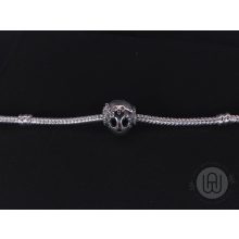 Charm, csillogó koponya 