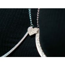 Testlánc, ezüst színű mell ív